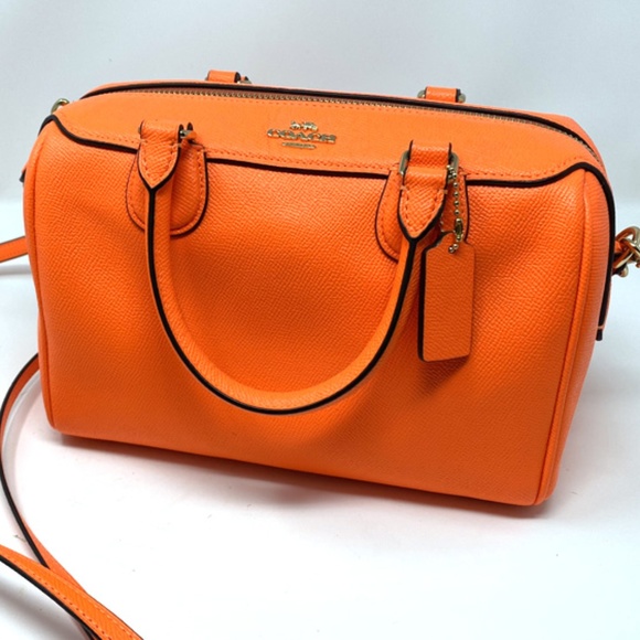 neon orange coach purse